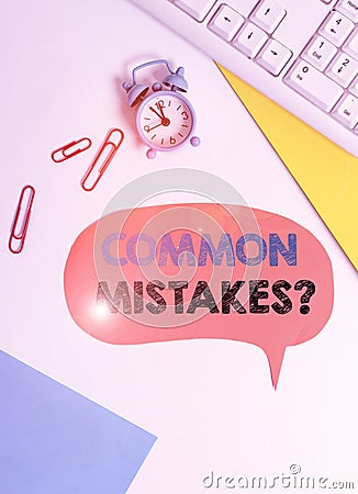 Text sign showing Common Mistakes question. Conceptual photo repeat act or judgement misguided or wrong Flat lay above table with Stock Photo