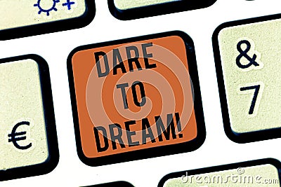 Text sign showing Dare To Dream. Conceptual photo Do not be afraid of have great ambitions goals objectives Keyboard key Stock Photo