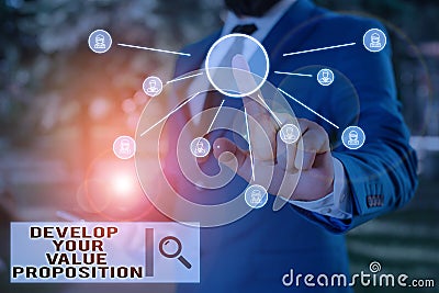 Text sign showing Develop Your Value Proposition. Conceptual photo Prepare marketing strategy sales pitch Male human Stock Photo