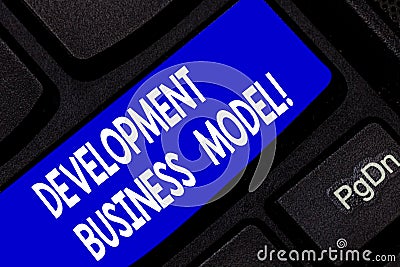 Text sign showing Development Business Model. Conceptual photo rationale of how an organization created Keyboard key Stock Photo