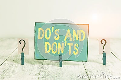 Text sign showing Do S And Don tS. Conceptual photo Rules or customs concerning some activity or actions Scribbled and crumbling Stock Photo