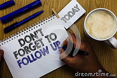 Text sign showing Don t not Forget To Follow Up. Conceptual photo asking someone to keep connection with others Man holding marker Stock Photo