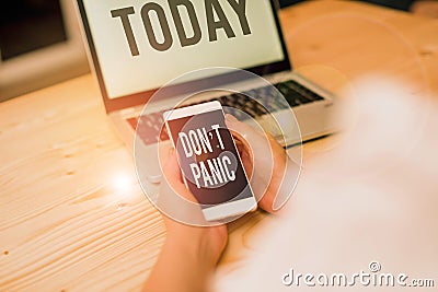 Text sign showing Don T Panic. Conceptual photo to avoid sudden uncontrollable fear or anxiety Keep calm woman laptop Stock Photo