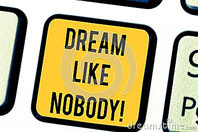 Text sign showing Dream Like Nobody. Conceptual photo wish for bigger things goals than everyone on planet Keyboard key Stock Photo