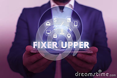 Text sign showing Fixer Upper. Conceptual photo house in need of repairs used chiefly connection with purchase. Stock Photo