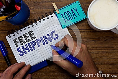 Text sign showing Free Shipping. Conceptual photo Freight Cargo Consignment Lading Payload Dispatch Cartage Man holding marker not Stock Photo