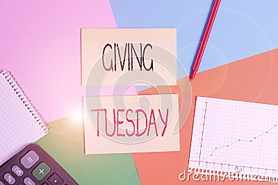 Text sign showing Giving Tuesday. Conceptual photo international day of charitable giving Hashtag activism Office appliance Stock Photo