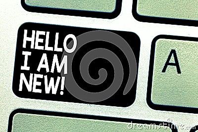 Text sign showing Hello I Am New. Conceptual photo Introducing yourself to unknown showing newbie in the team Keyboard Stock Photo