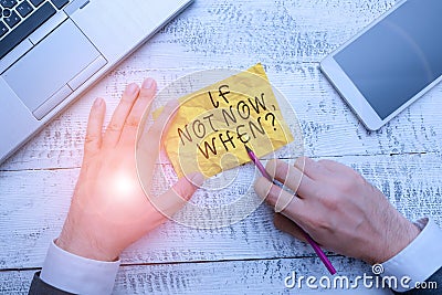 Text sign showing If Not Now When Question. Conceptual photo start acting from this moment do not hesitate Hand hold Stock Photo
