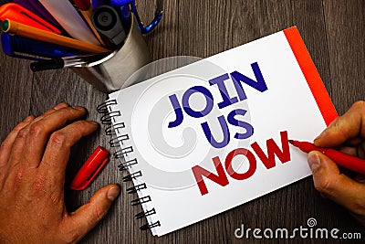 Text sign showing Join Us Now. Conceptual photo Enroll in community Register in website or form Recruit Penholder notepad marker f Stock Photo