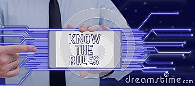 Text sign showing Know The Rules. Business overview Learn the accepted principle or instructions to follow Woman Holding Stock Photo