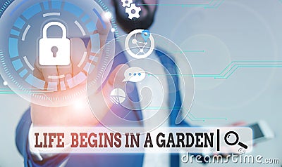 Text sign showing Life Begins In A Garden. Conceptual photo Agriculture Plants growing loving for gardening Male human Stock Photo