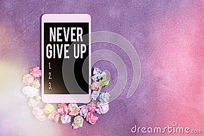 Text sign showing Never Give Up. Conceptual photo be persistent to keep on trying to improve the condition Paper Stock Photo