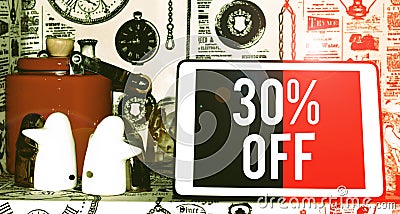 Text sign showing 30 Percent Off. Conceptual photo 30 percent reduction on the original price of a product Classic penguin ceramic Stock Photo