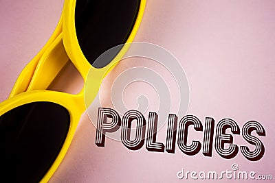 Text sign showing Policies. Conceptual photo Business Company or Government Rules Regulations Standards written on Plain Pink back Stock Photo