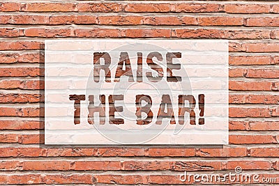 Text sign showing Raise The Bar. Conceptual photo Set higher standards challenges seeking for excellence Brick Wall art Stock Photo