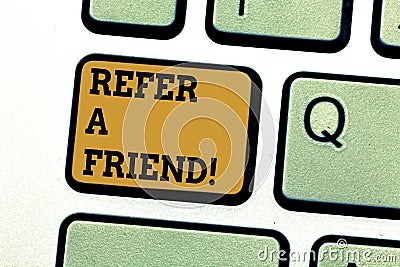 Text sign showing Refer A Friend. Conceptual photo Recommendation Appoint someone qualified for the task Keyboard key Stock Photo