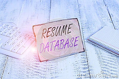 Text sign showing Resume Database. Conceptual photo database of candidates that you can search by skillset Notepaper stand on Stock Photo
