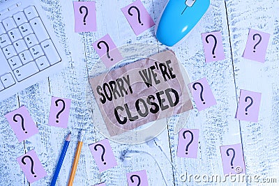 Text sign showing Sorry We Re Closed. Conceptual photo Expression of Regret Disappointment Not Open Sign Writing tools Stock Photo