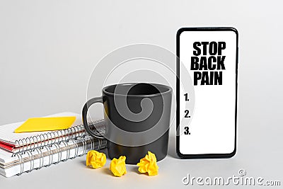 Text sign showing Stop Back Pain. Word Written on Medical treatment for physical symptoms painful muscles Man Holding A Stock Photo