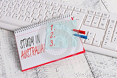 Text sign showing Study In Australia. Conceptual photo going into foreign country order complete your studies notebook Stock Photo