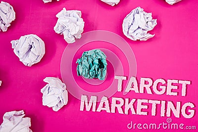 Text sign showing Target Marketing. Conceptual photo Market Segmentation Audience Targeting Customer Selection Text Words pink bac Stock Photo