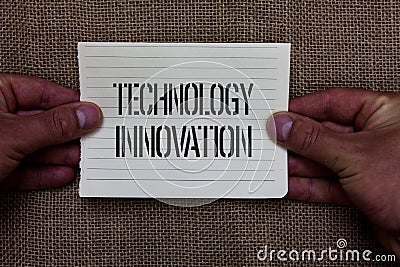 Text sign showing Technology Innovation. Conceptual photo advanced net connected devices a Creative Technique Man holding piece no Stock Photo