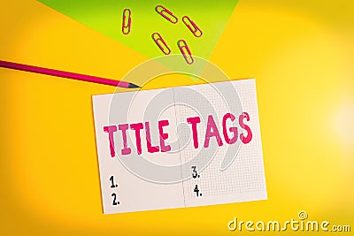 Text sign showing Title Tags. Conceptual photo the HTML element that specifies the title of a web page Blank paper sheet pencil Stock Photo