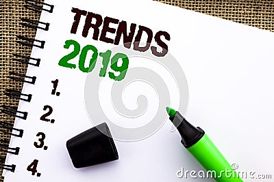 Text sign showing Trends 2019. Conceptual photo Current Movement Latest Branding New Concept Prediction written on Notebook Book o Stock Photo