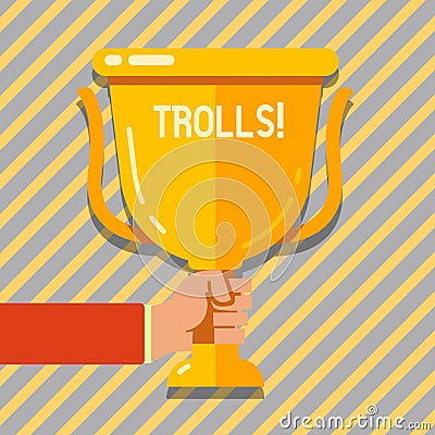 Text sign showing Trolls. Conceptual photo Online troublemakers posting provocative inflammatory messages Hand Holding Stock Photo