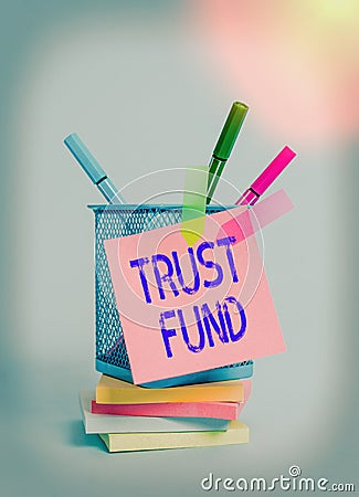 Text sign showing Trust Fund. Conceptual photo money that is being held by the trustees for the beneficiaries Sticky note arrow Stock Photo
