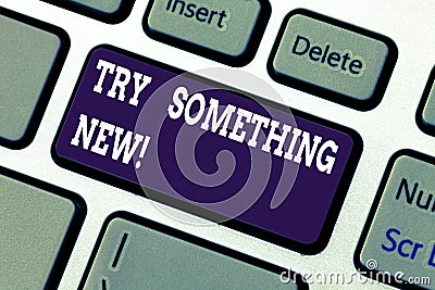 Text sign showing Try Something New. Conceptual photo start doing anything you did not made or know before Keyboard key Stock Photo