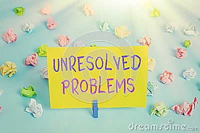 Text sign showing Unresolved Problems. Conceptual photo those Queries no one can answer Unanswerable Questions Colored crumpled Stock Photo
