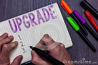 Text sign showing Upgrade. Conceptual photo Raise something to higher standard Improve make better enhance Man holding Stock Photo