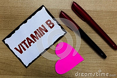 Text sign showing Vitamin B. Conceptual photo Highly important sources and benefits of nutriments folate Love pure wood colour har Stock Photo