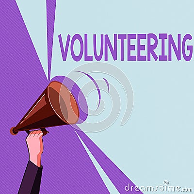 Text sign showing Volunteering. Conceptual photo Provide services for no financial gain Willingly Oblige Hu analysis Hand Holding Stock Photo