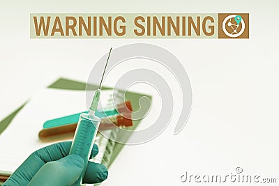 Text sign showing Warning Sinning. Business showcase stop the action which is believed to break the laws Writing Stock Photo