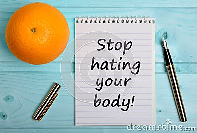 Text Stop hating your body Stock Photo