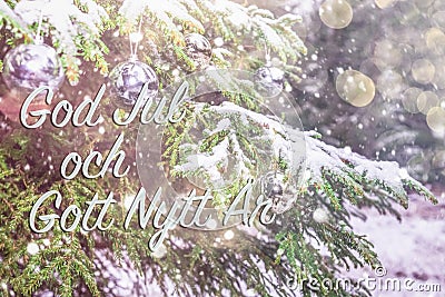 Text in Swedish `God jul och gott nytt ar`means `Merry Christmas and Happy New Year`. Stock Photo