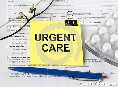 The text Urgent Care is written on a yellow sticker next to the magnifying glass and electronic thermometer Stock Photo