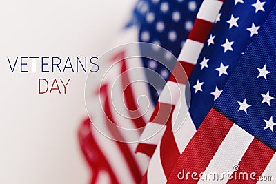 Text veterans day and american flags Stock Photo