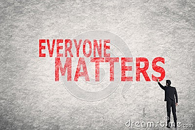Text on wall, Everyone Matters Stock Photo