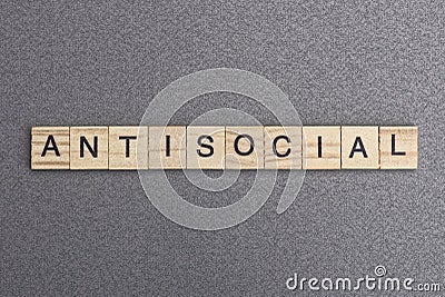 Text the word antisocial from wooden small letters Stock Photo