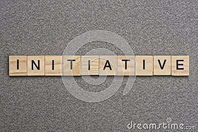 Text the word initiative from wooden small letters Stock Photo
