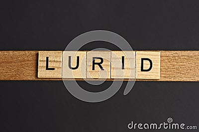 Text on word lurid from gray wooden letters Stock Photo