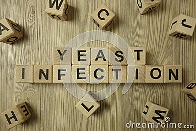 Text yeast infection from wooden blocks Stock Photo