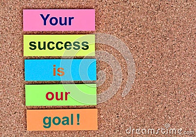 Text Your success is our goal on notes Stock Photo