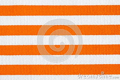 Textile background with orange and white stripes. Fabric texture Stock Photo