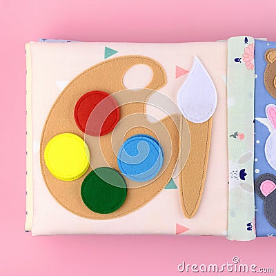 Watercolor paint from felt in a textile book Stock Photo