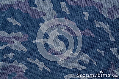 Textile camouflage uniform color background pattern. Stock Photo